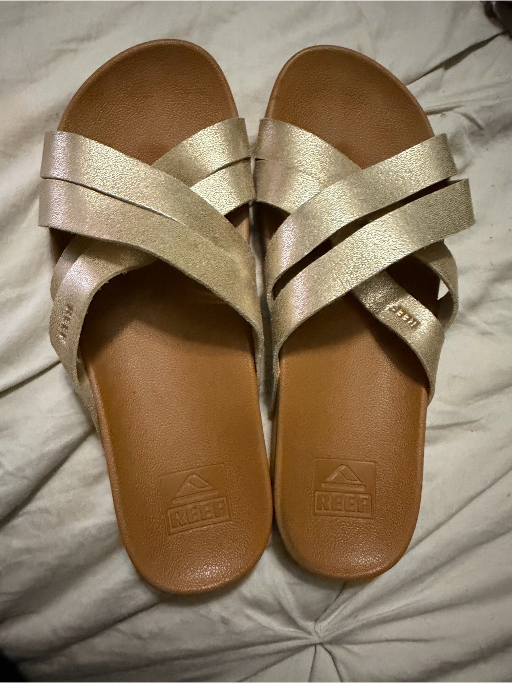 Reef Women's Cushion Spring Bloom slide sandal in champagne